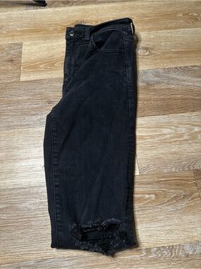 American Eagle Outfitters Black Skinny Jeans with Distressed Hem